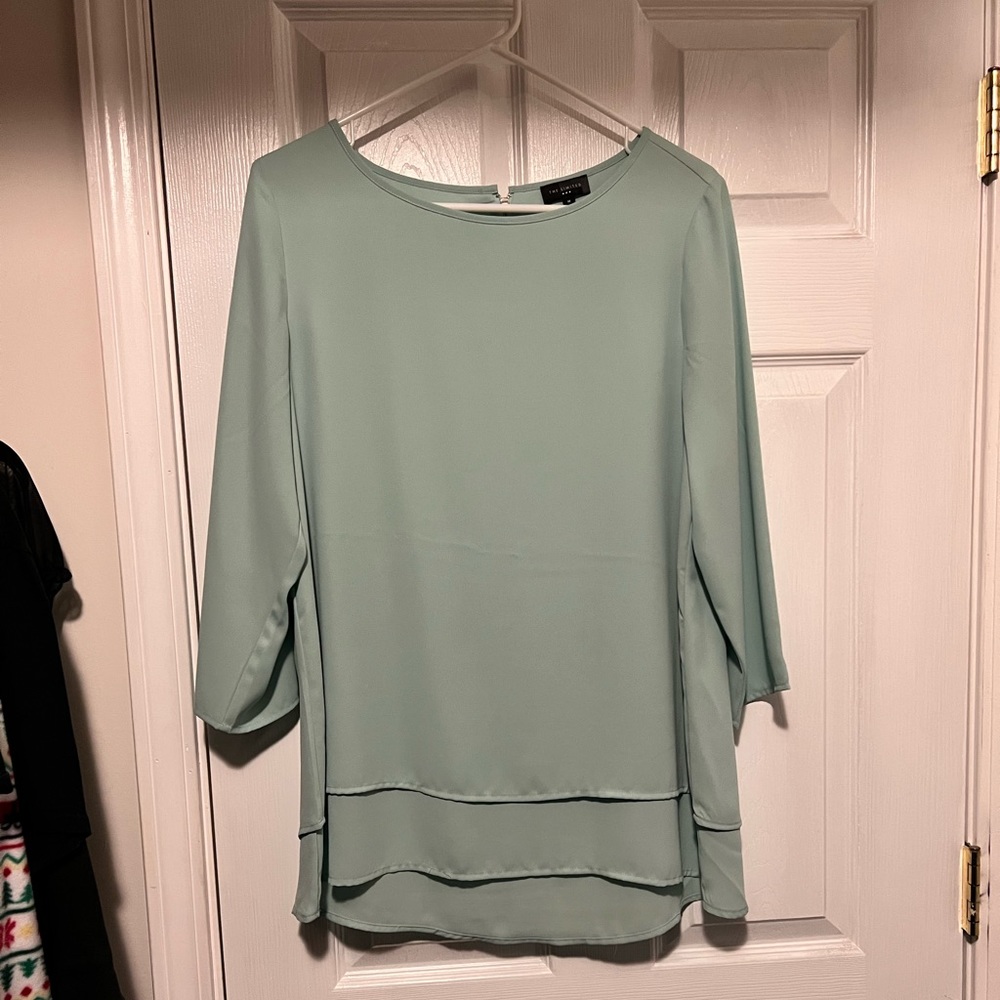 The limited sea foam green blouse